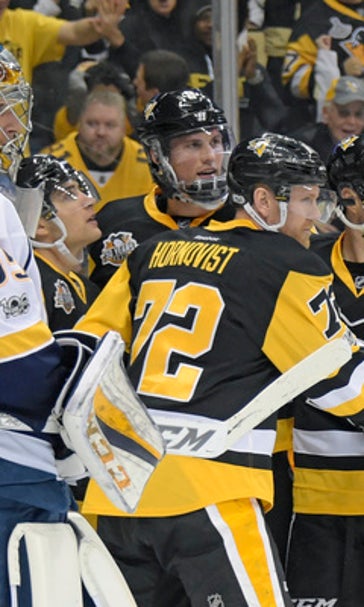The Latest: Pittsburgh holds off Predators in Game 1